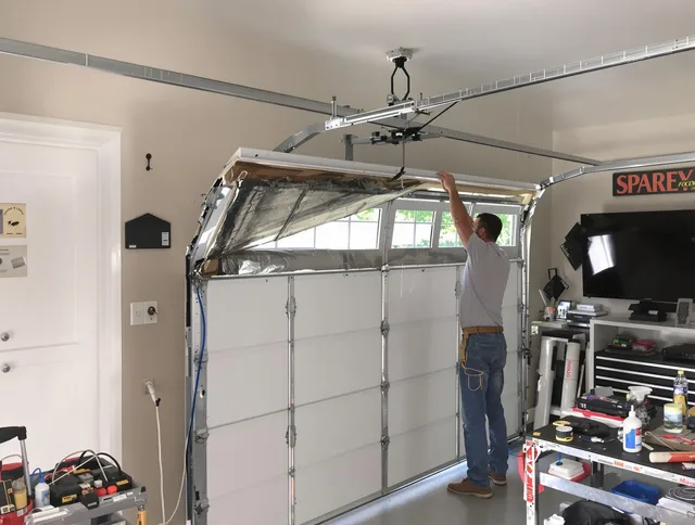 Garage door section replacement by Uxbridge Garage Door Repair in Uxbridge
