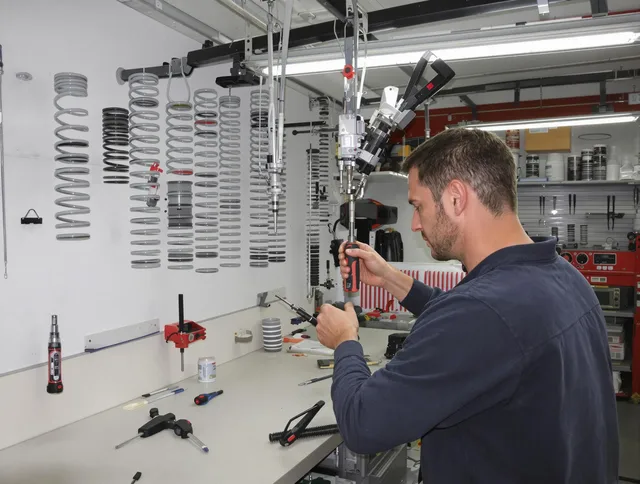 Uxbridge Garage Door Repair safety certified technician performing precision spring replacement in Uxbridge