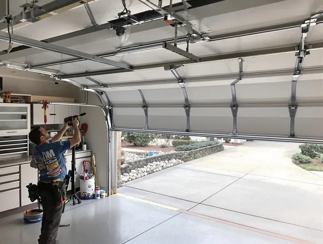 Garage door track repair service by Uxbridge Garage Door Repair in Uxbridge